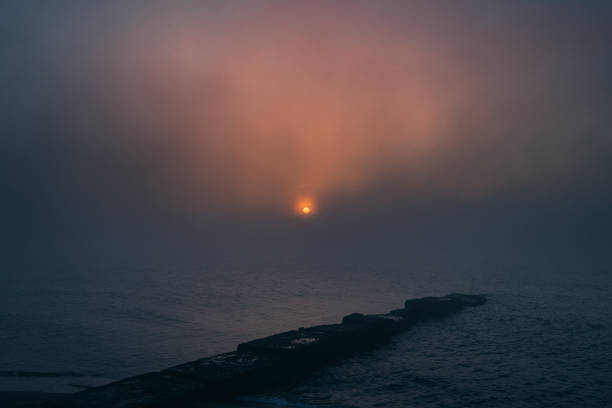 Sunrise over the sea - pier, sea, storm clouds