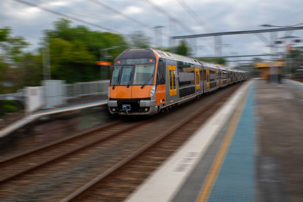 istock Commuter Train fast moving through a Station in Sydney NSW Australia 1301298945