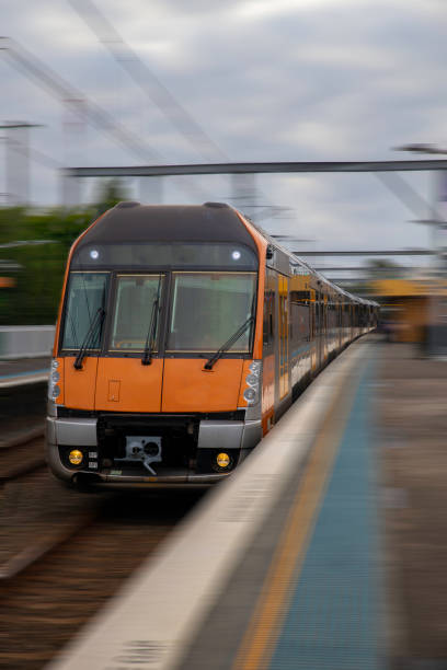 istock Commuter Train fast moving through a Station in Sydney NSW Australia 1301298975