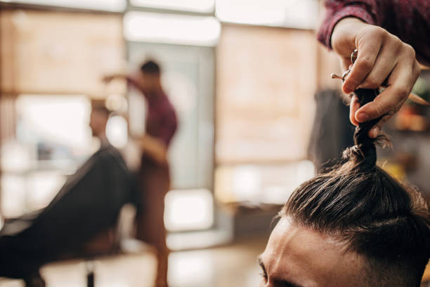 istock Busy day in barber shop 1301301019