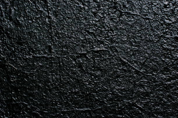 istock Texture of dark black glossy painted wall 1301301214