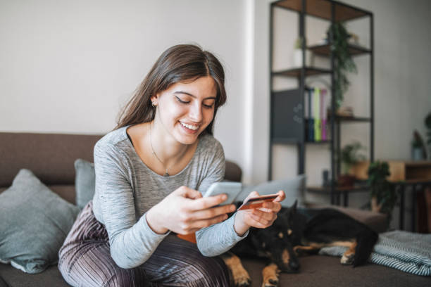 istock Young woman shopping online. 1301308528