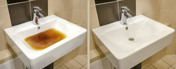 istock Blockage in the sink before and after the problem is resolved. Clog problems in the bathroom and toilet 1301308662