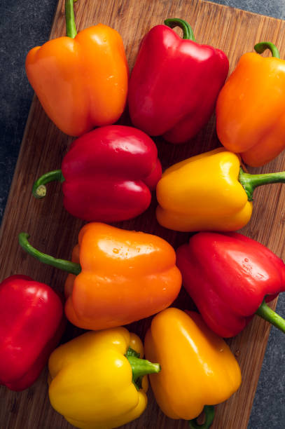 Orange, red and yellow bell peppers
