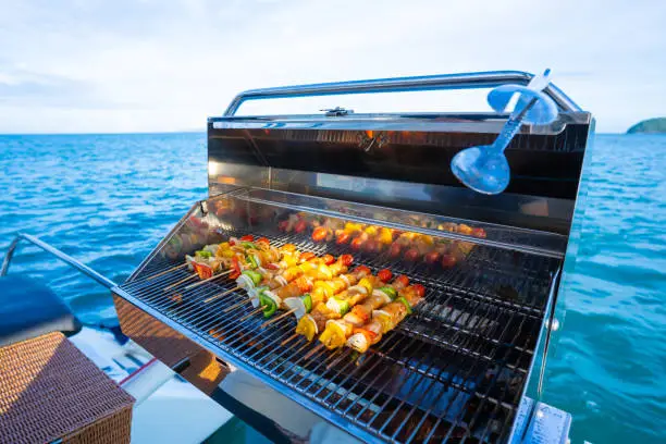 Photo of grill shrimp barbecue and seafood sauce