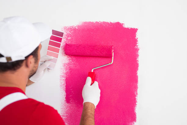 istock Unrecognizable contractor choosing paint color 1301314284