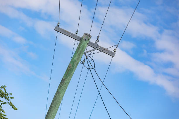 istock Power Pole and Electricity Wires 1301315569