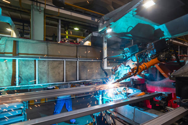istock Welding robot, the process of welding a metal profile 1301317538