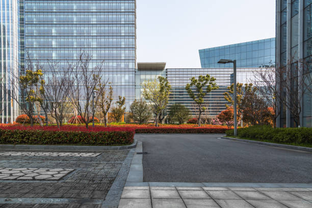 istock clean asphalt road through office block area,suzhou,china. 1301318160