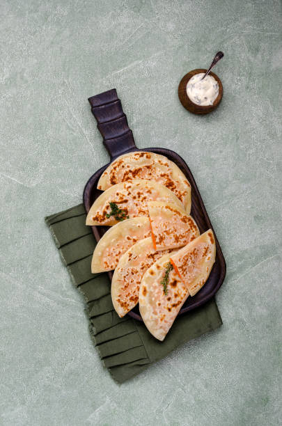 istock Baked bread with vegetable filling 1301320831