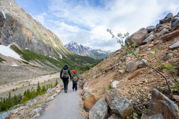 istock Mother and Son Hiking at Mount Edith Cavell, Alberta, Canada 1301325356