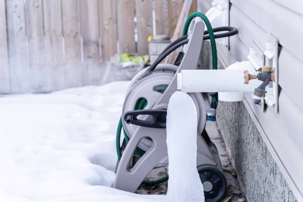 istock Furnace exhaust pipe blowing out steam in winter 1301330346