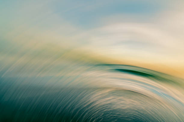 Ocean sunset at high tide, abstract seascape, motion blur