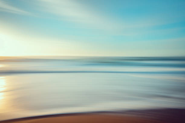 istock Abstract seascape background, sunset on the beach, motion blur, bright colors 1301333431