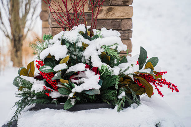 istock Flower pot in public park covered in snow 1301334250