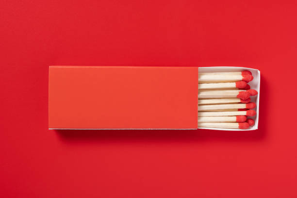 red matchbox and red match sticks on a red background red matchbox and red match sticks on a red background unlit match stock pictures, royalty-free photos & images