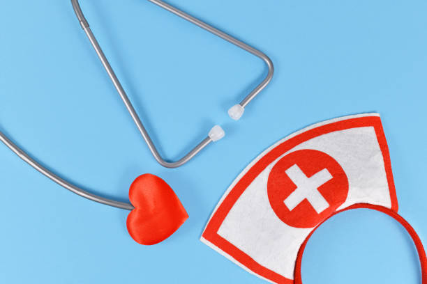 istock Heart shaped stethoscope and nurse headband 1301337109