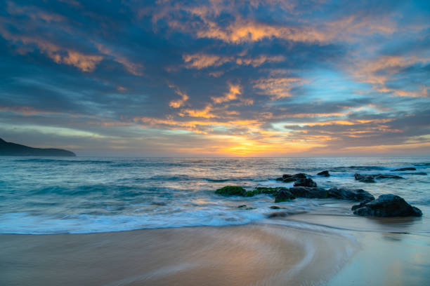 istock High cloud beautiful sunrise seascape 1301339524