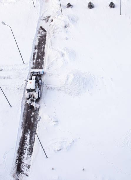 istock Snow plow tractor cleans the track in winter 1301346514