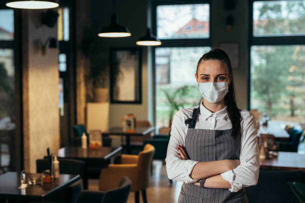 istock waitress in cafeteria or restaurant 1301346597