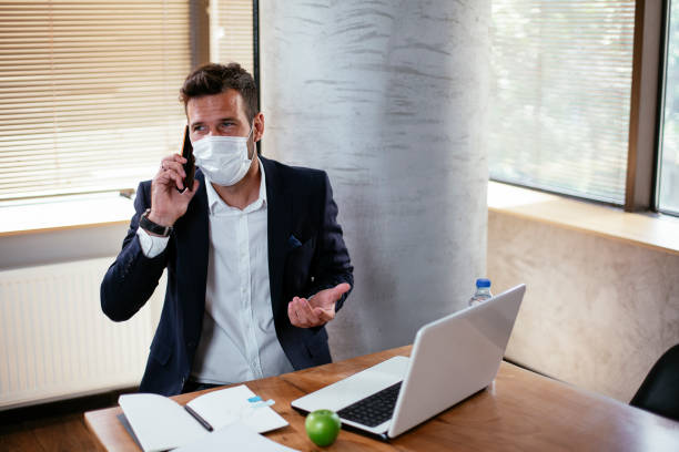 istock Businessman talking to the phone 1301348878