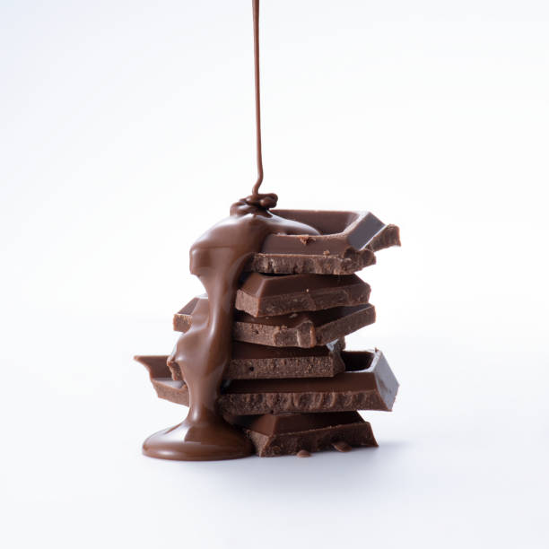 chocolate dripping on a chocolate bar - cake chocolate cake chocolate gateaux imagens e fotografias de stock