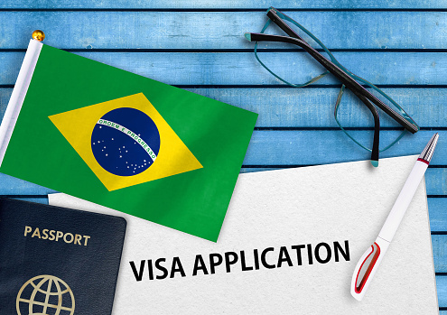 Visa application form and flag of Brazil