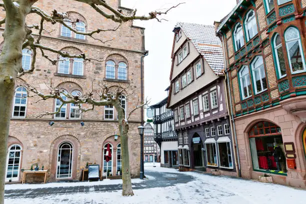 View of Alsfeld town hall, Weinhaus and church on main square, Germany. Historic city in Hesse, Vogelsberg, with old medieval frame half-timbered houses called Fachwerk or Fachwerhaus in German