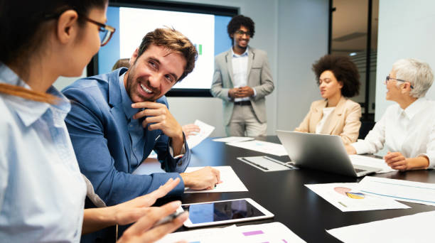 istock Image of business partners discussing documents and ideas 1301351991
