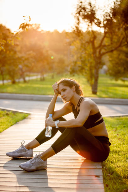 istock Woman resting after exercising 1301352078