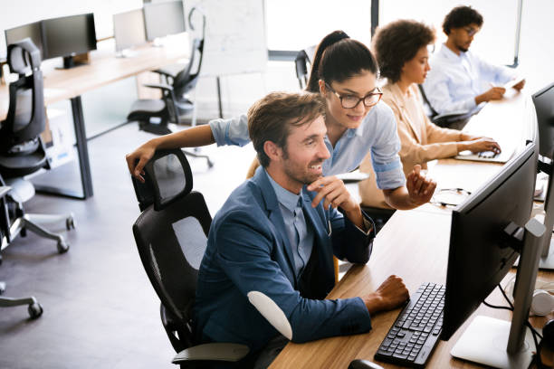istock Startup business people group of programmer working as team to find solution to problem 1301352145
