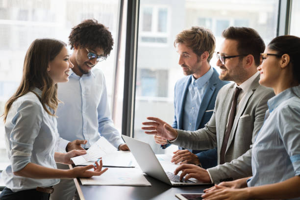 istock Collaboration and analysis by business people working in office 1301352503