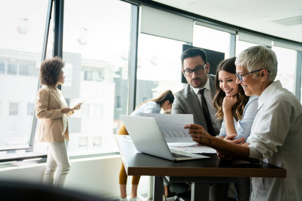 istock Collaboration and analysis by business people working in office 1301352546