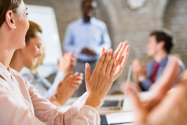 istock Applauding on successful business presentation! 1301353919