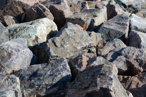 istock Rock. Granite. Large stones. The structure of the stone. Breakwater. 1301354749