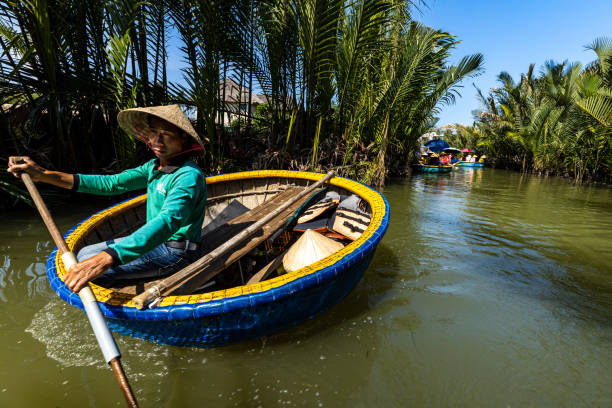 The Basket Boats at Hoi An in Vietnam Hoi An, Quang Nam, Vietnam - December 13, 2019: The Basket Boats at Hoi An in Vietnam basket boat stock pictures, royalty-free photos & images