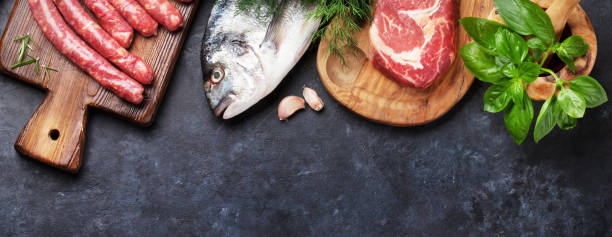 istock Sausages, fish and meat cooking 1301358114