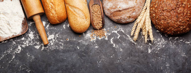 istock Various bread with wheat, flour and cooking utensils 1301358161