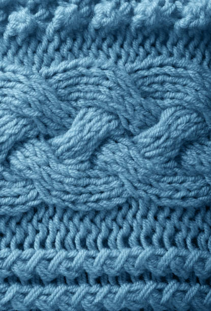 istock Blue knitted handmade warm textured background close-up 1301358283