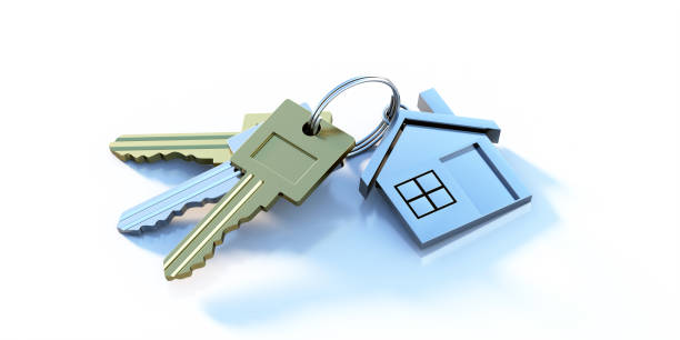 istock Keys bunch on house shaped key chain on white background. Copy space. 1301360039