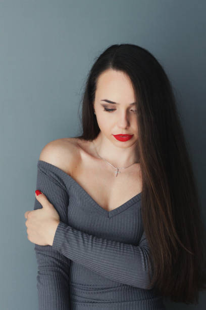 istock Beautiful young model, longhair girl with bright make-up, red lips 1301362296