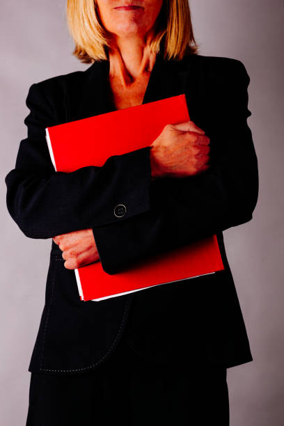 istock Business woman holding a folder 1301363086