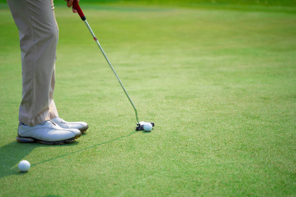 istock Golfers are about to play golf on bright green grass 1301363681