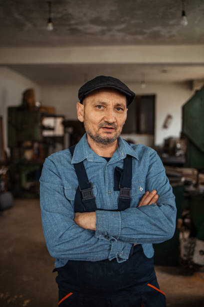 istock Senior metal worker in his workshop 1301371020