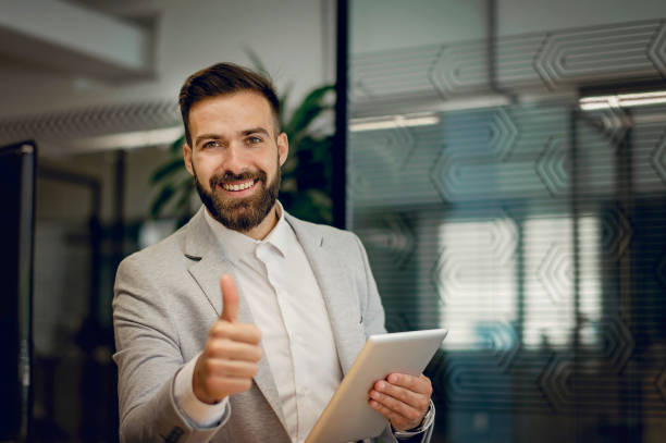 istock Young businessman working at office 1301374894