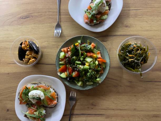 istock salad with mushrooms and vegetables. Dinner at home top view 1301376192