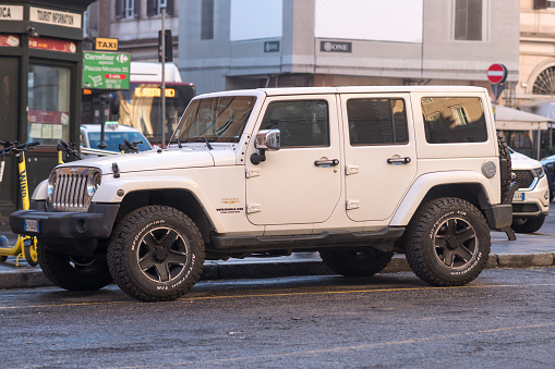 Rome, Italy - January 17, 2021: Jeep Wrangler Unlimited Sahara. Jeep is brand of American automobiles that is a division of FCA US LLC, a wholly owned subsidiary of Fiat Chrysler Automobiles