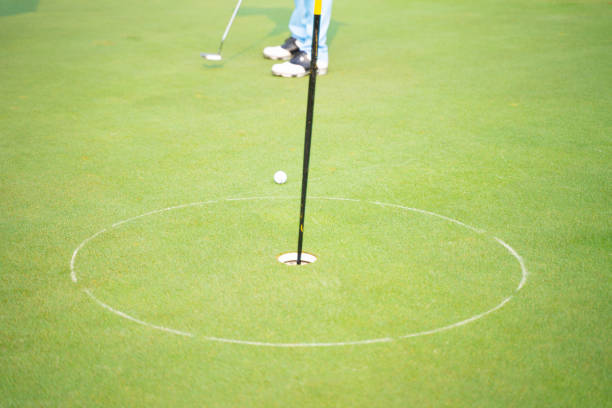 istock Golfers are about to play golf on bright green grass 1301378987