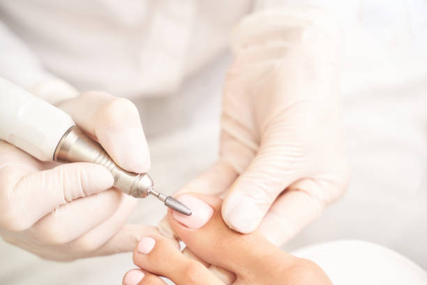 istock Pedicure nail spa procedure. Foot manicure 1301379913