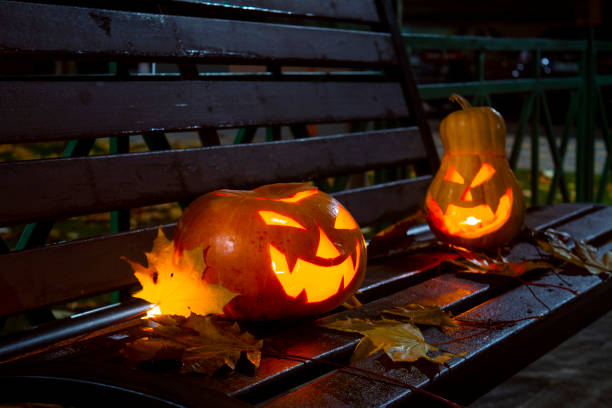 istock Halloween pumpkins with carved demonic faces 1301381715